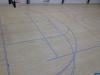 Accelerate Sports - Taping out the Lines for the Basketball Court